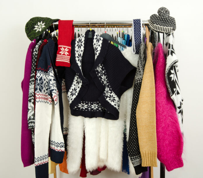 Cute,Sweaters,With,Snowflakes,Displayed,On,A,Rack.,Wardrobe,With The Art of Dressing Consciously